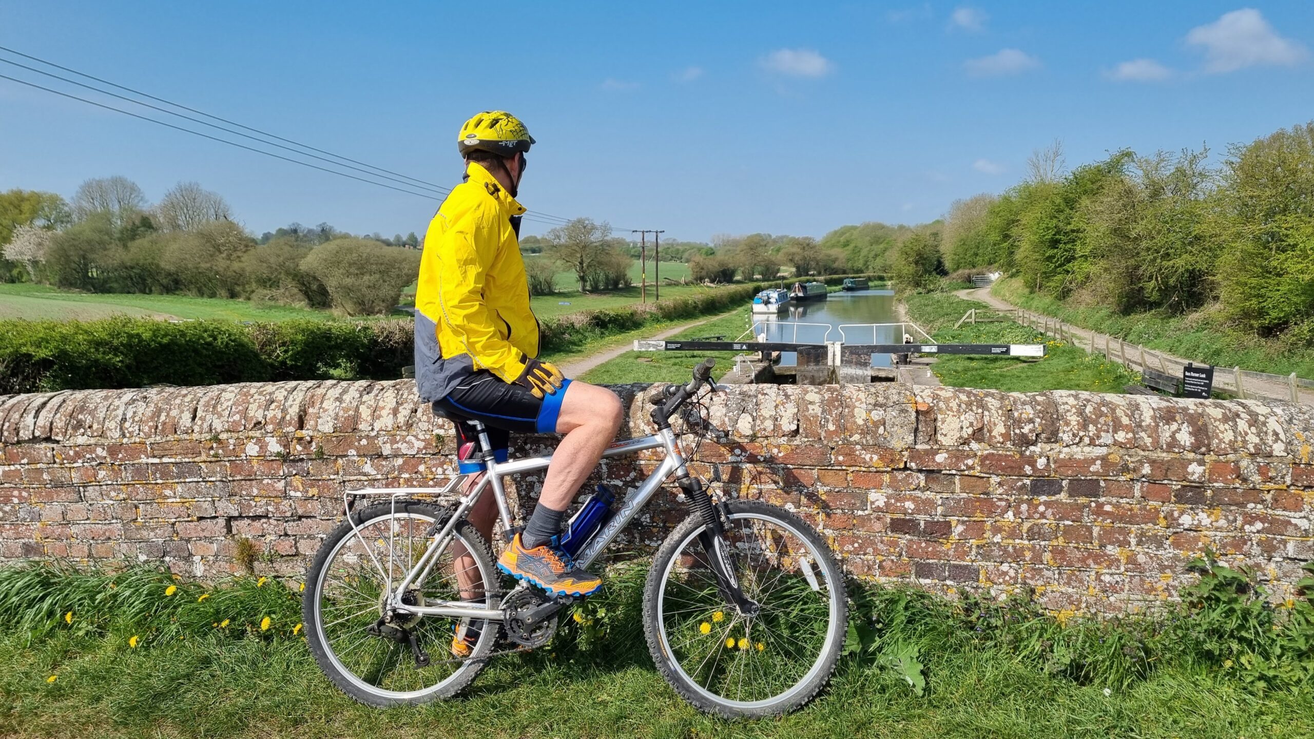 Cyclist on canal bridge